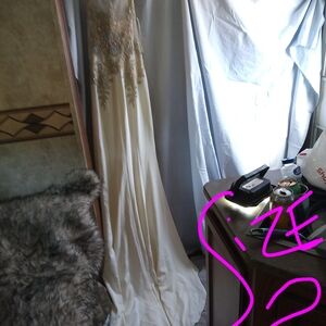 Elegant Cream Gown with Gold Embellishments